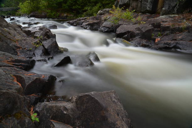 istock Beautiful Wisconsin flowing river waters in time exposure 1303074965