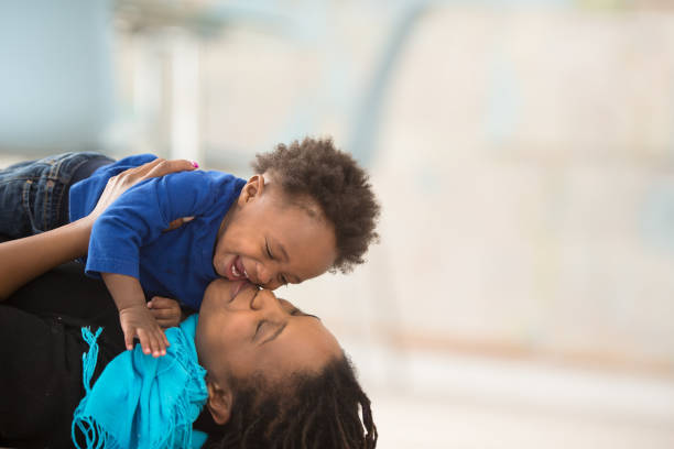 istock A kiss for you, my son! 1303075877