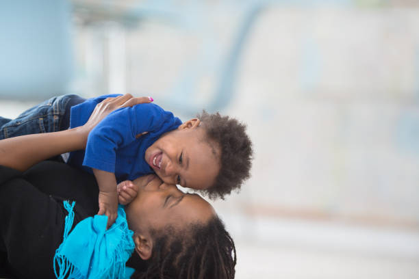 istock A kiss for you, my son! 1303075879
