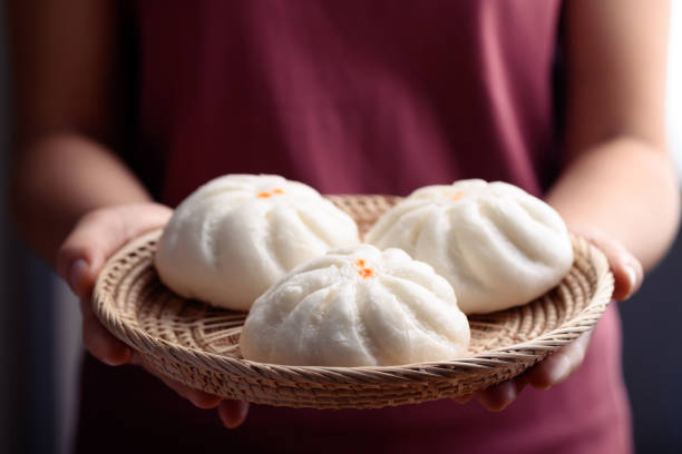 istock Steamed buns stuffed with minced pork 1303076990