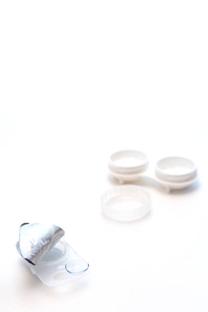 istock Open case with contact lenses on white background with copy space 1303080639