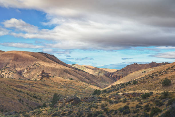 istock Leslie Gulch Landscape with Clouds 1303083413