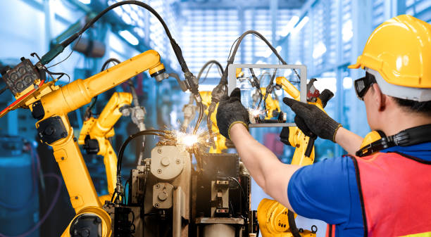 istock Smart industry robot arms for digital factory production technology 1303083585