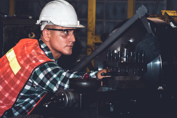 istock Smart factory worker or engineer do machine job in a manufacturing workshop 1303084394