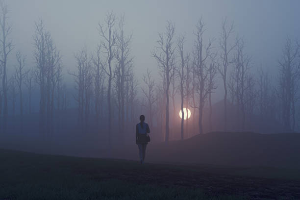 istock Woman walking towards mysterious light 1303085388