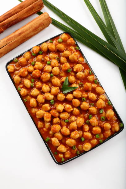 istock Spicy chana masala served in a plate . 1303089661