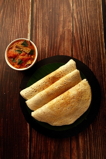 Homemade fresh dosai with sambar and coconut chutney. vegan diet meal concept.