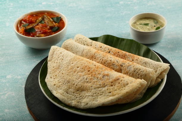 istock Healthy vegan diet- dosa with curry. 1303091921