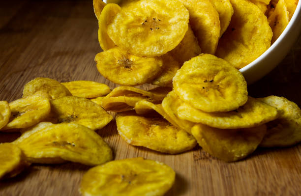 Crispy banana chips in a bowl. Common Indian savory item