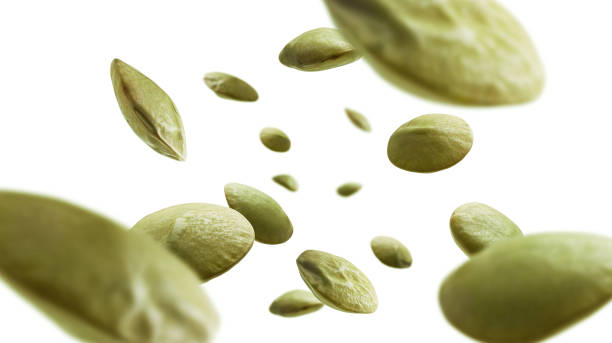 istock Green lentils levitate on a white background 1303099854