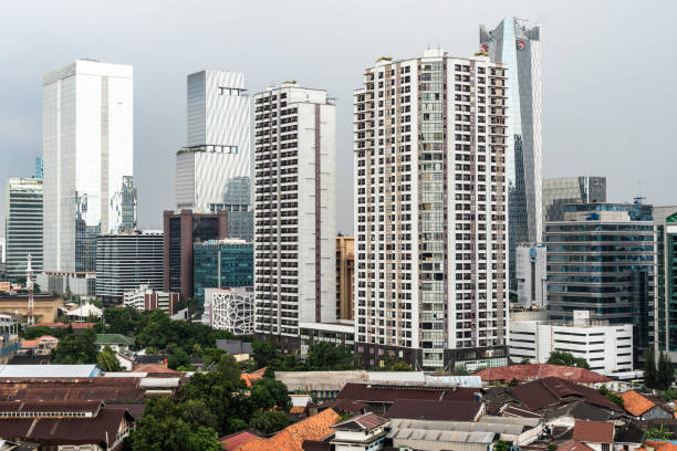 istock Jakarta apartment tower and office building 1303106977