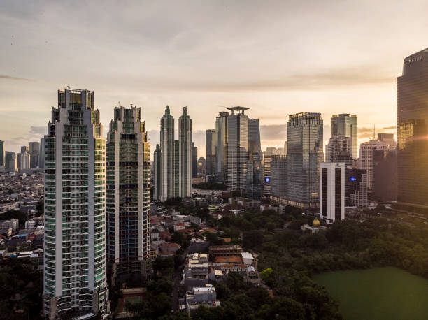 istock Sunset over Jakarta financial district 1303107051