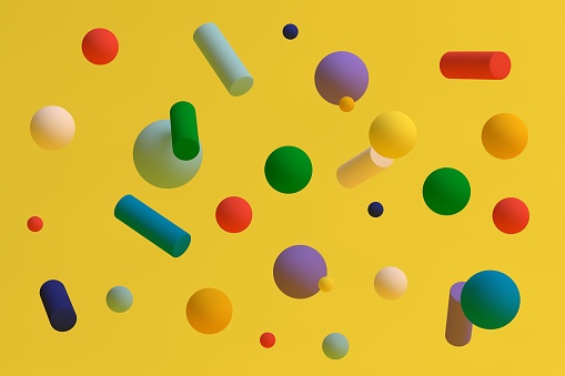 Abstract colored spheres on yellow background