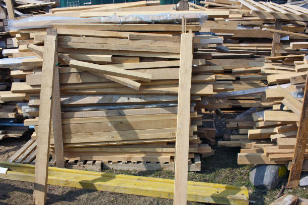 istock Many wooden planks at a construction  site 1303108582