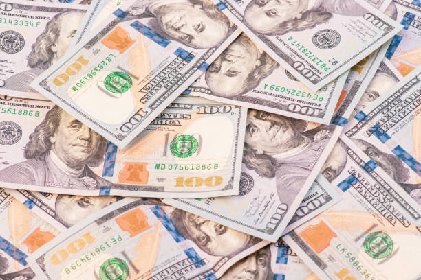 istock lots of hundred-dollar bills for the background 1303109805