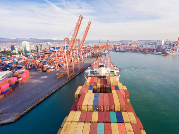 istock Aerial view of cargo ship in transit. 1303110506