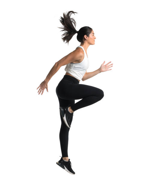 istock Athletic woman running and jumping on white background 1303110603