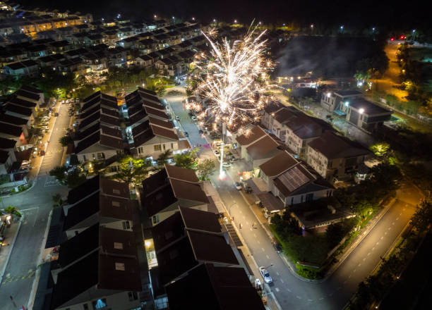 London, UK.  November 4th 2023.  Fireworks celebrating the traditional British Guy Fawkes bonfire night of 5th November exploding above a row of houses in a suburb of north London.