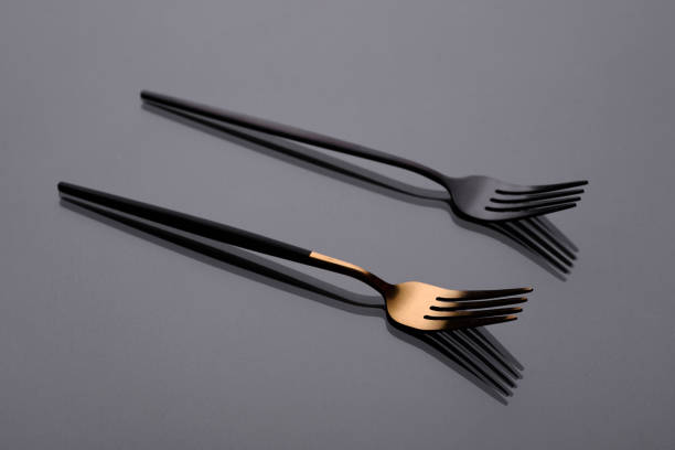 istock Cutlery on a gray background with shadow. Table serving 1303117032