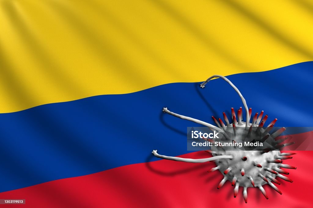 Colombian Flag attacked by Covid-19 Virus. Pandemic Corona Virus Concept Bacterium Stock Photo