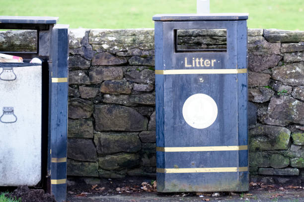 istock Black litter bin for rubbish in public area 1303120986