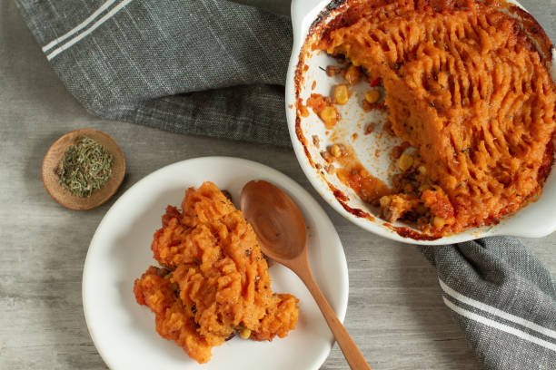 Healthy traditional shepherd pie made with mashed sweet potatoes stock photo