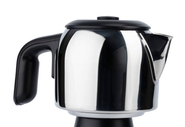 istock Metal tea kettle close up on white 1303123086