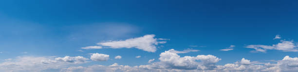 istock Fuffy clouds in blue sky. Summer good weather skyscape high resolution background. 1303125777