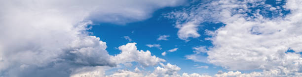 istock Fuffy clouds in blue sky. Summer good weather skyscape background. 1303125805