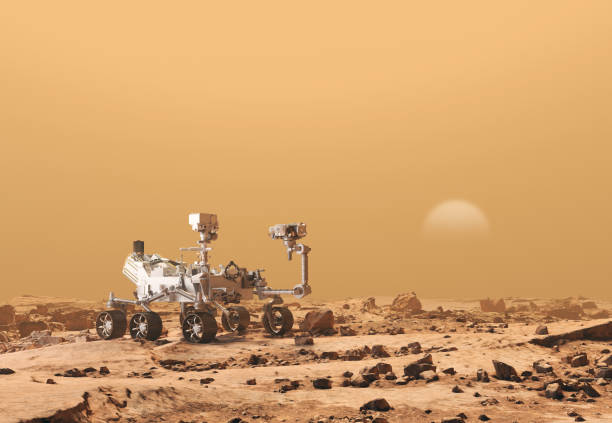 istock Mars Rover Perseverance exploring the red planet. Exploration mission in 2021. Rocky soil and dense, sandy atmosphere. Some elements of this image furnished by NASA. 3d rendering 1303126886