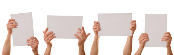 istock Set of four A4 sheets holding with both hands isolated 1303127095