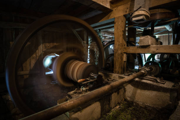 istock Spinning wheel of old watermill 1303129073