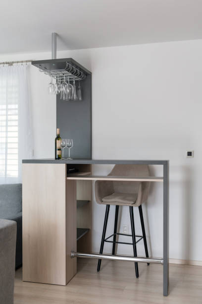 istock Bar stool and wooden table in modern living room 1303129583