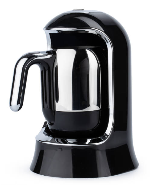 istock Electric kettle on a stand isolated on white 1303130144