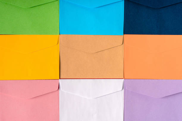 istock Colored envelopes lie on the table in the form of a pattern or background 1303131999