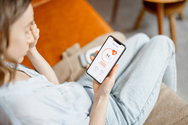 istock Woman measure heart rate with smart technology 1303137522