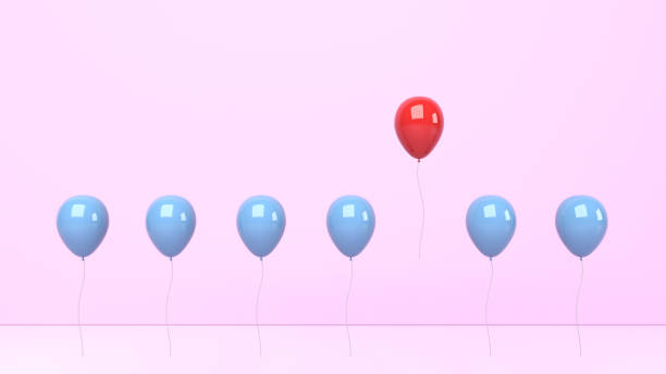 istock Standing out from the crowd and different concept, red and blue balloon on pink background 1303139530