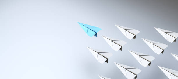 istock Leadership concept, blue leader plane leading white planes, on white background with empty copy space on left side 1303139537