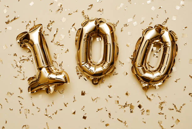 istock Shiny balloons with glitters on festive background. 1303139791