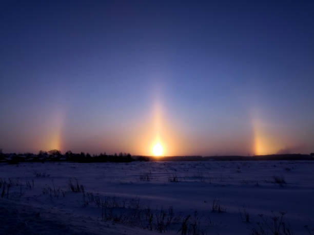 Colored appear in the winter sky at dawn halos of the sun sundog stock pictures, royalty-free photos & images