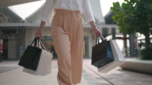 Close-up Woman walking with Sopping bag, Slow motion, Shoot format on 4:2:2 10bit All-i