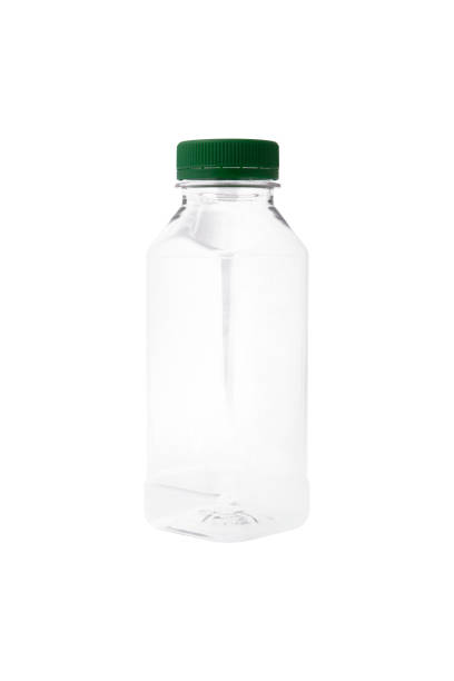 istock Plastic organic juice bottles with fresh juice isolated on white background 1303142084