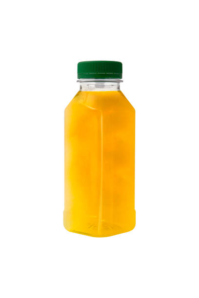 istock Plastic organic juice bottles with fresh juice isolated on white background 1303142094