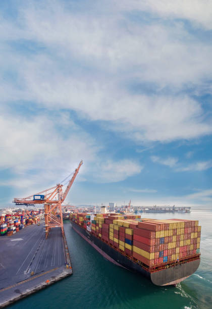 istock Aerial view of cargo ship in transit. 1303144686