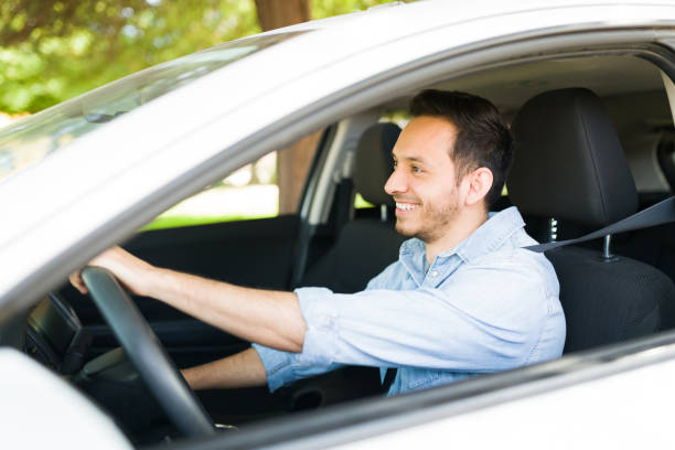 istock Taxi driver feeling excited behind the wheel 1303145835