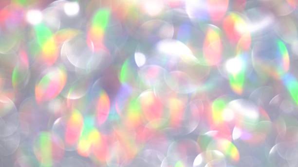 istock Holographic glitter. Magic circles lights abstract background. Blurred colorful light dots 1303150421