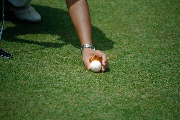 istock Golfers are playing golf in the evening golf course 1303154061