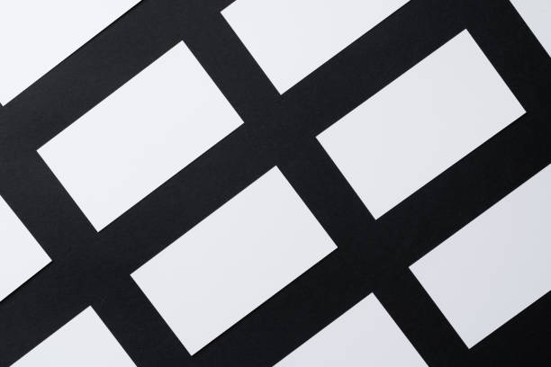 istock White blank business cards on dark black background 1303155307