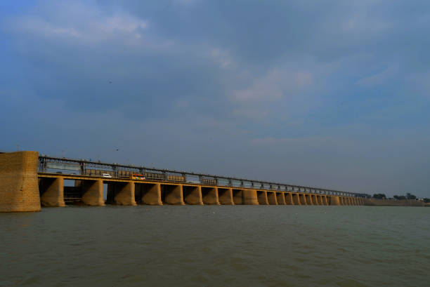 Hydroelectric plant on the river, water flows