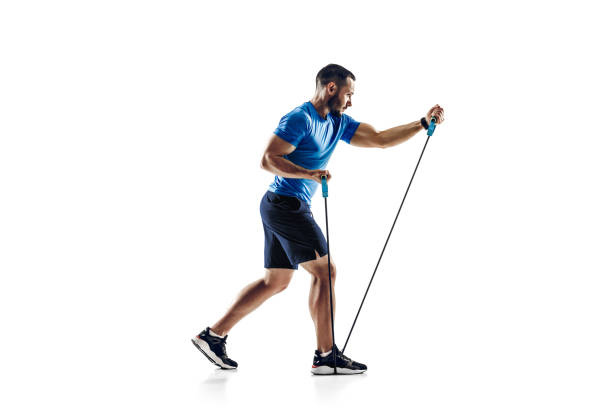 istock Caucasian professional male runner, athlete training isolated on white studio background. Copyspace for ad. 1303160974